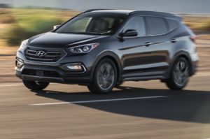2018 Hyundai Santa Fe Sport front three quarter in motion 02 1