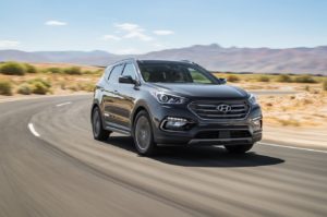 2018 Hyundai Santa Fe Sport front three quarter in motion 07
